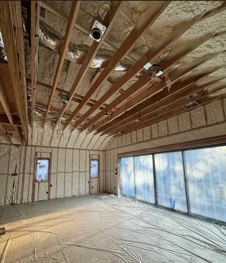 Interior walls and ceiling insulated with spray foam during new construction in Statesville